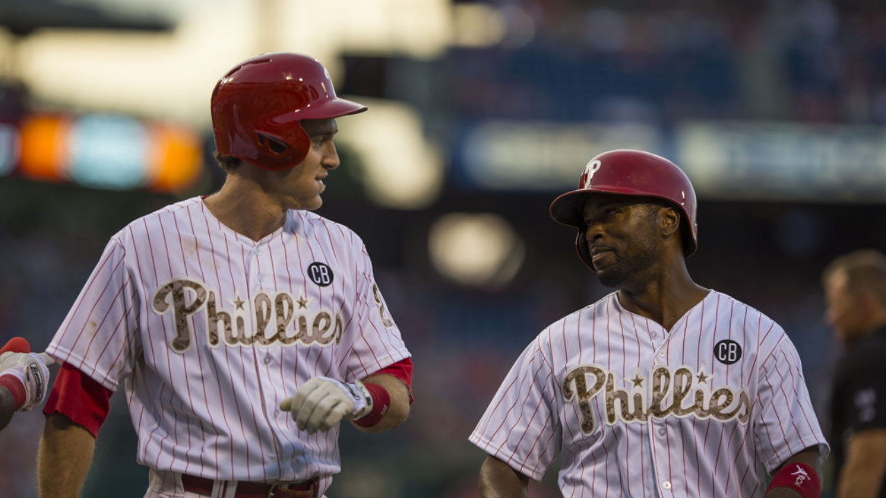 Philadelphia Phillies' Chase Utley heads to the plate past Florida